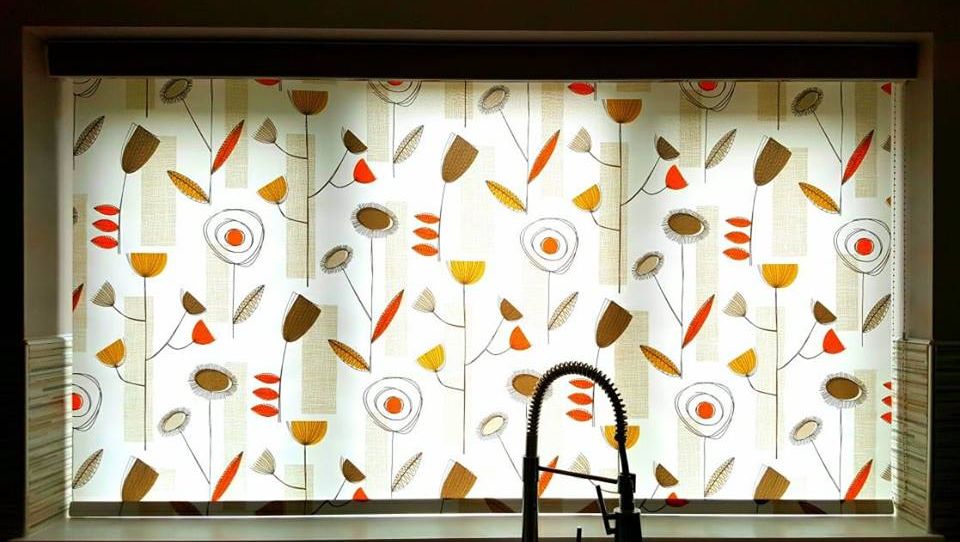 Roller blinds blocking out light in a kitchen