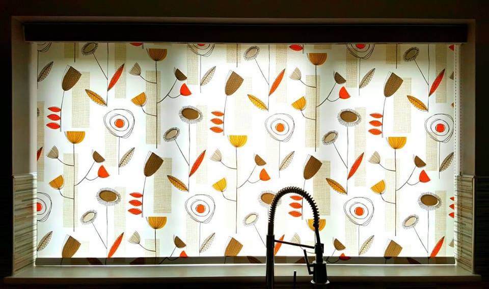 Roller blinds blocking out light in a kitchen